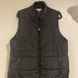 Maurice’s women’s black long puffy vest. Size 1x.